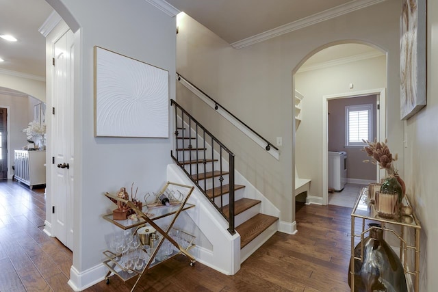 stairway featuring wood-type flooring and ornamental molding