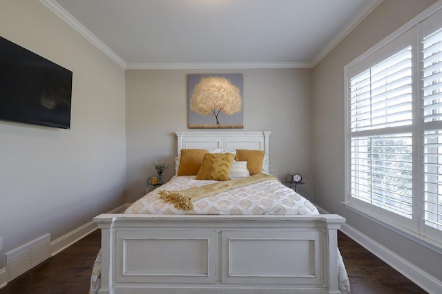 bedroom featuring crown molding and dark hardwood / wood-style flooring