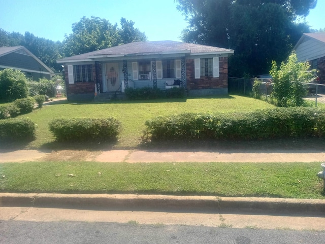 view of front facade with a front yard