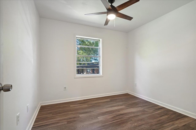 unfurnished room featuring dark hardwood / wood-style flooring and ceiling fan