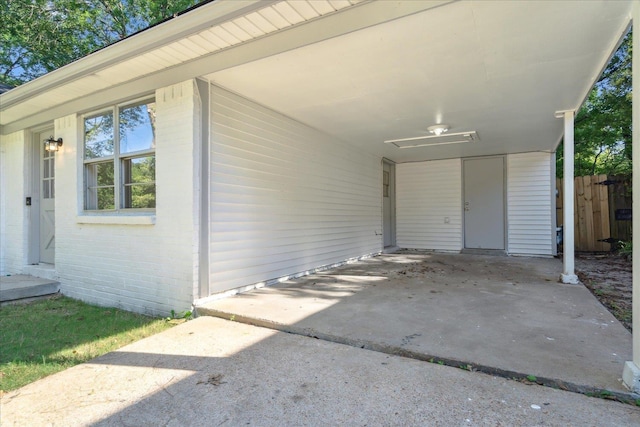 entrance to property with a carport