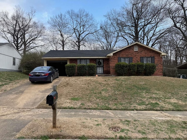 ranch-style house with a garage and a front yard