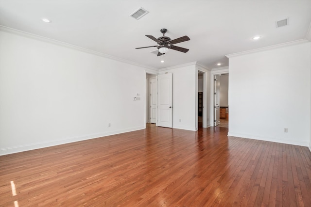 unfurnished room featuring hardwood / wood-style flooring, ceiling fan, and ornamental molding