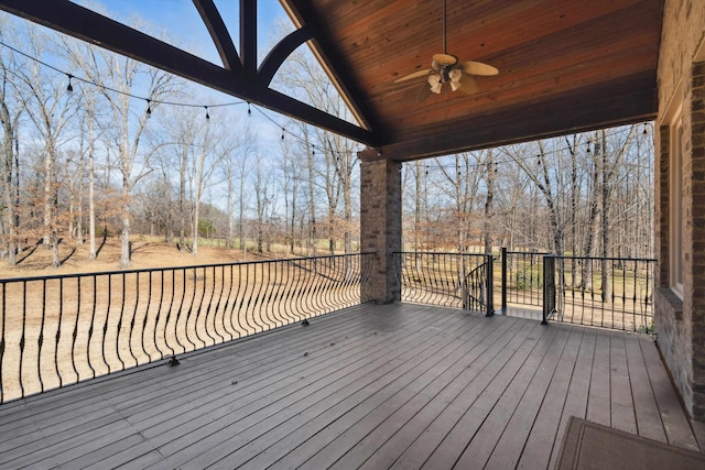 wooden deck with ceiling fan