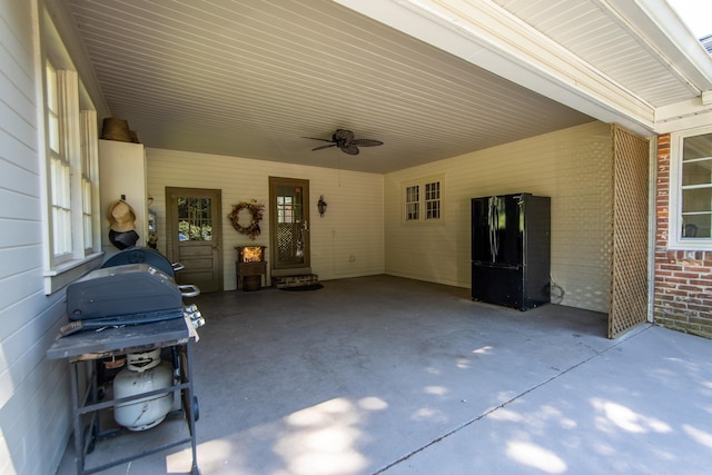 view of patio featuring grilling area and ceiling fan