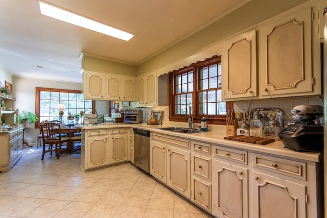 kitchen with sink, stainless steel dishwasher, ornamental molding, kitchen peninsula, and decorative backsplash