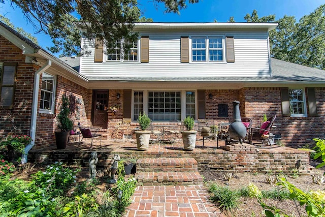 front facade featuring a patio area