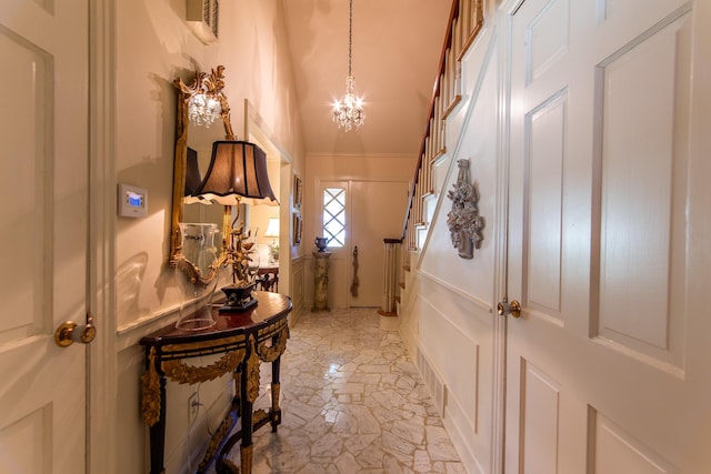 entryway featuring an inviting chandelier