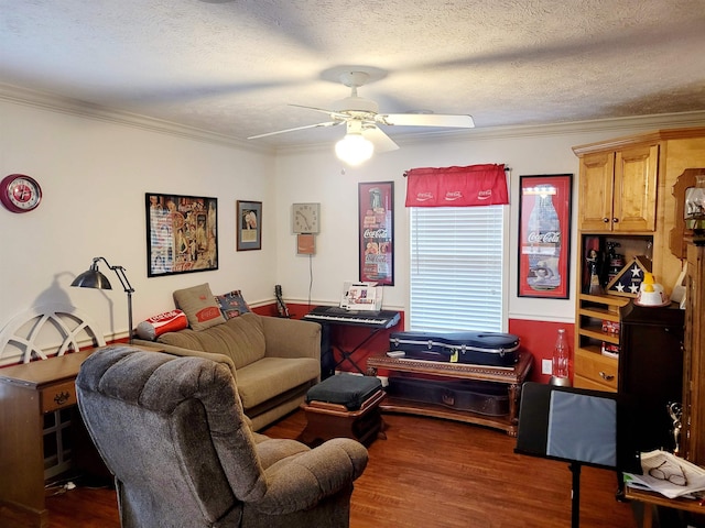 living room with dark wood-type flooring, ceiling fan, crown molding, and a textured ceiling