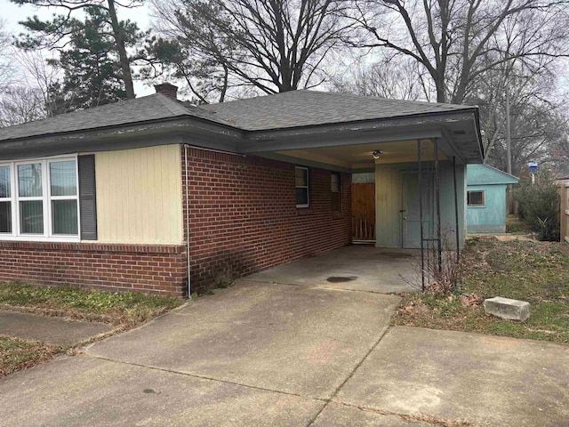 view of front of property with a carport