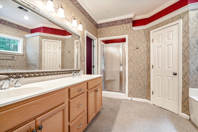 bathroom with vanity, crown molding, and walk in shower