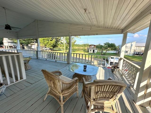 wooden terrace with ceiling fan