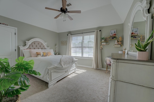 bedroom with ceiling fan, lofted ceiling, and light carpet