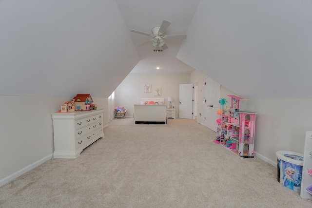 recreation room with light carpet, lofted ceiling, and ceiling fan