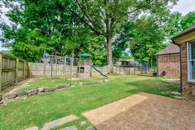 view of yard featuring a playground