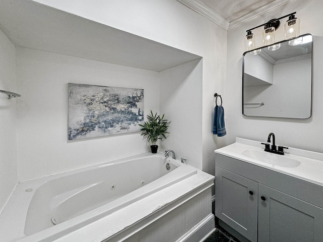 bathroom with crown molding, a washtub, and vanity