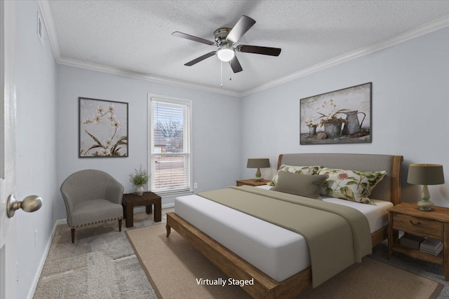 bedroom featuring a ceiling fan, baseboards, a textured ceiling, crown molding, and light carpet