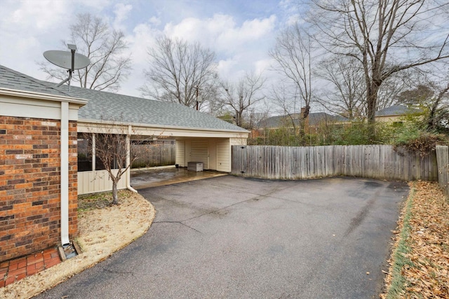 view of patio featuring a carport