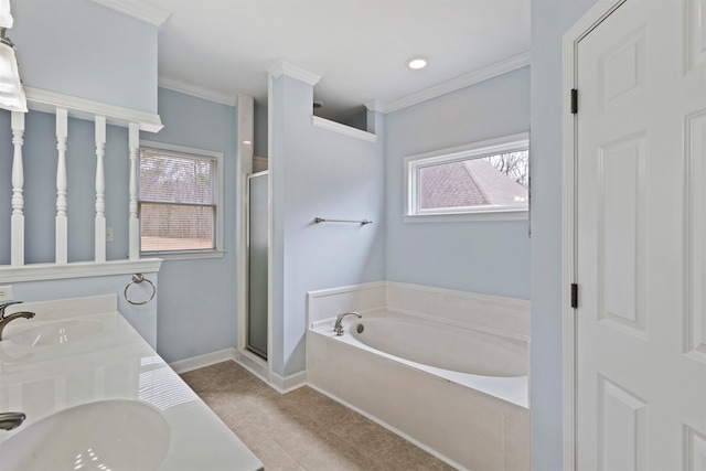 bathroom featuring ornamental molding, independent shower and bath, and a wealth of natural light