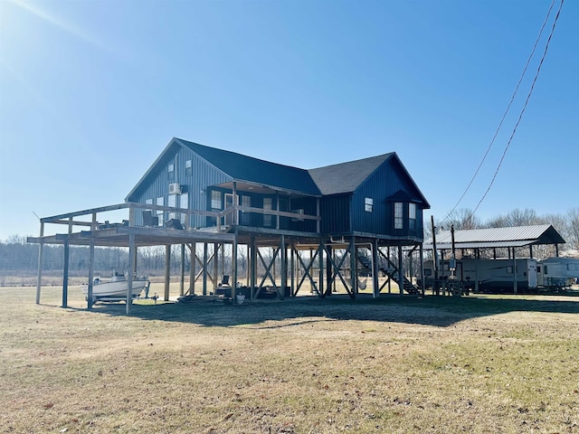 back of house with a yard