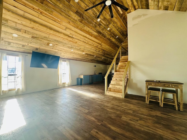 additional living space with lofted ceiling, sink, dark hardwood / wood-style flooring, ceiling fan, and wooden ceiling