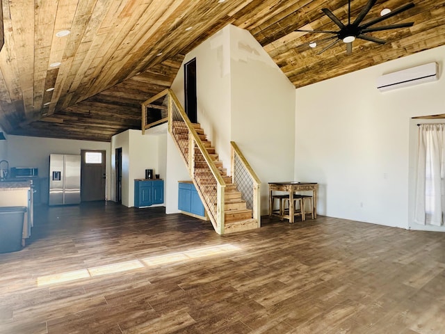 unfurnished living room featuring dark wood-type flooring, wood ceiling, high vaulted ceiling, a wall unit AC, and ceiling fan