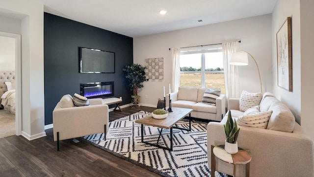 living room featuring dark hardwood / wood-style flooring