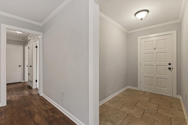 foyer entrance featuring crown molding