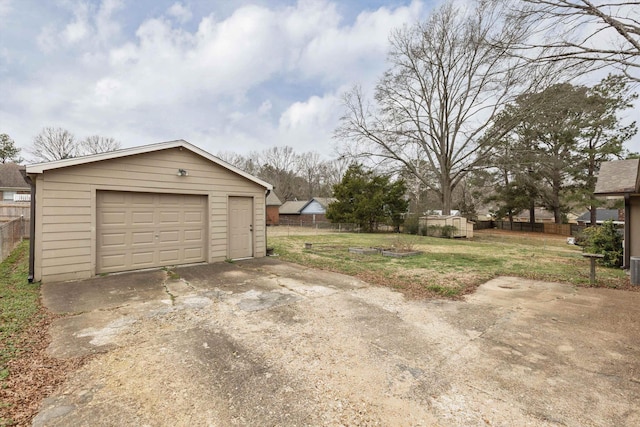 garage featuring a yard