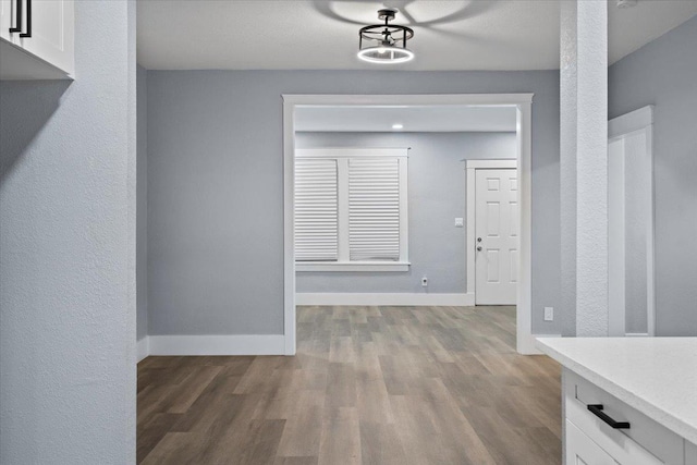 hallway featuring light hardwood / wood-style flooring