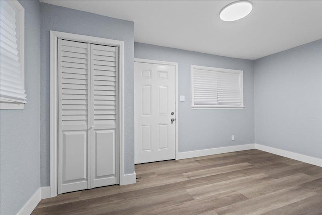 foyer with light hardwood / wood-style floors