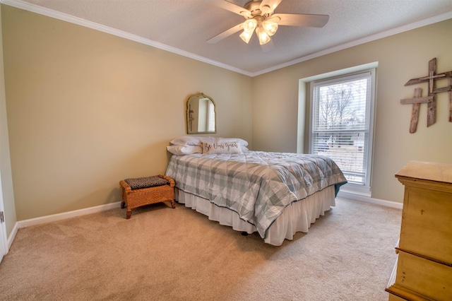 bedroom with crown molding, light carpet, a textured ceiling, and ceiling fan