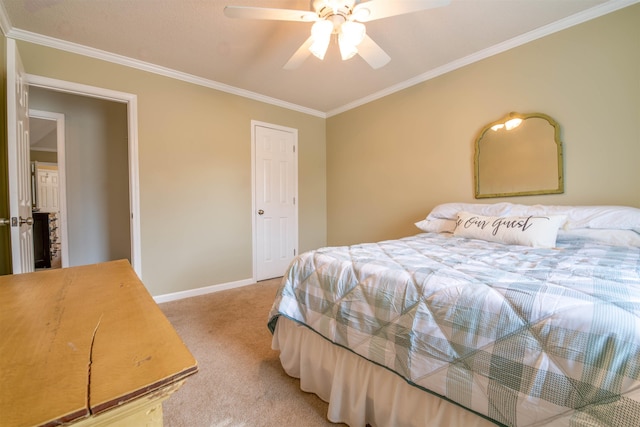 carpeted bedroom featuring ornamental molding and ceiling fan