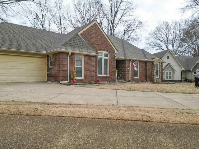 single story home with a garage