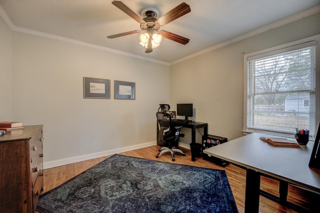 office area featuring wood-type flooring, a textured ceiling, ceiling fan, and crown molding