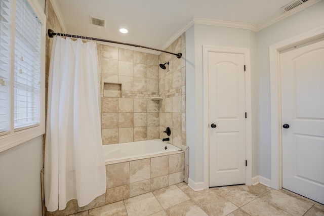 bathroom with shower / tub combo with curtain and ornamental molding