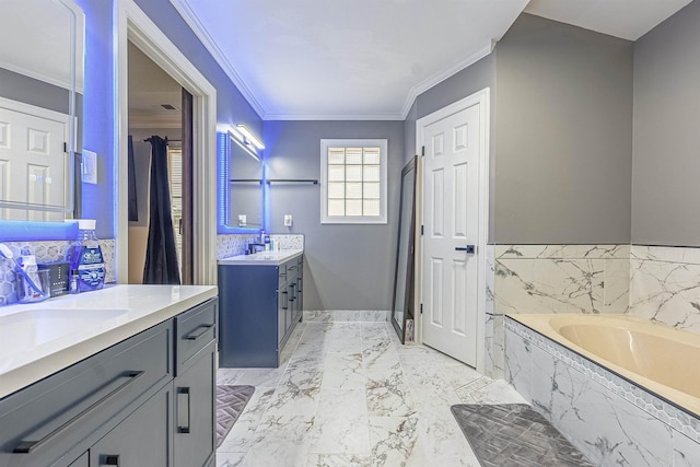 bathroom featuring crown molding, vanity, and tiled tub