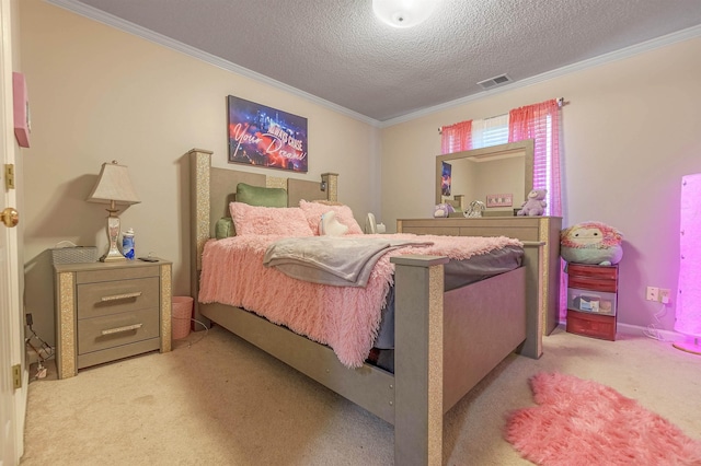 carpeted bedroom with ornamental molding and a textured ceiling