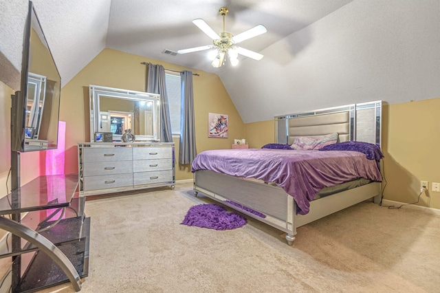 bedroom featuring lofted ceiling, light colored carpet, and ceiling fan