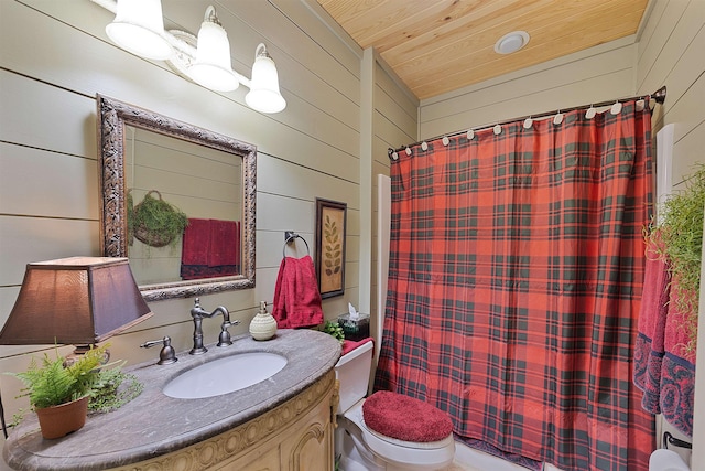 full bathroom featuring wood ceiling, vanity, toilet, and wood walls