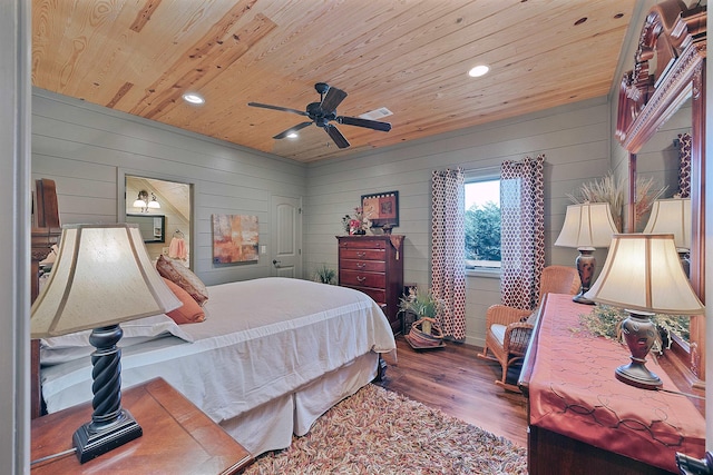 bedroom with hardwood / wood-style flooring, ceiling fan, and wood ceiling