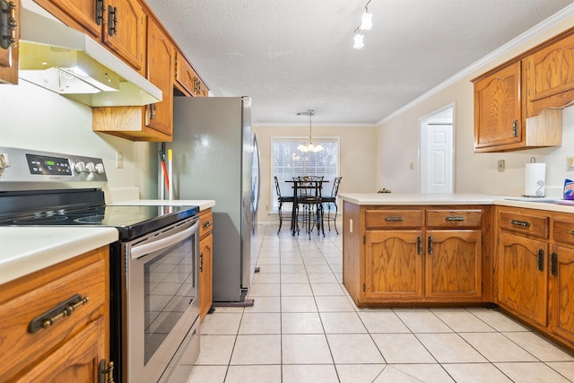 kitchen featuring light tile patterned flooring, appliances with stainless steel finishes, pendant lighting, ornamental molding, and a textured ceiling