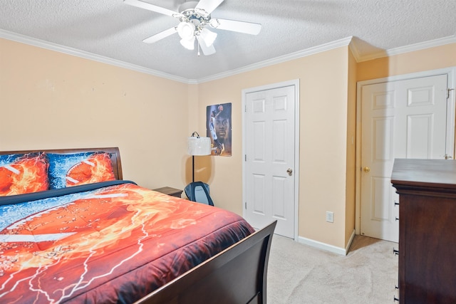 carpeted bedroom featuring crown molding, ceiling fan, and a textured ceiling