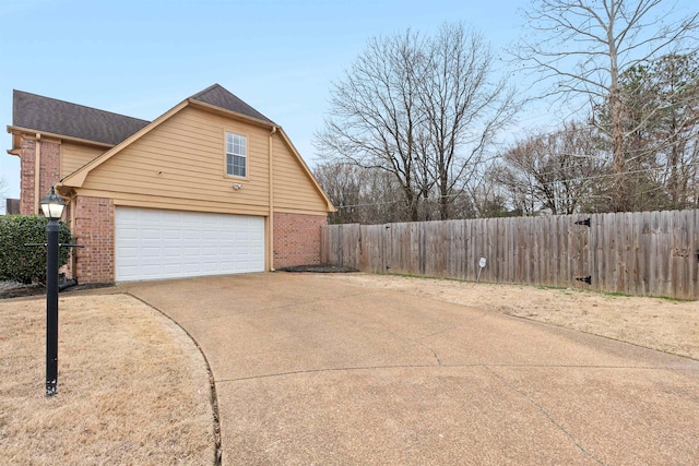 view of home's exterior with a garage