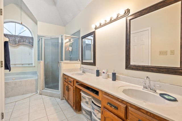 bathroom with vanity, separate shower and tub, tile patterned floors, and lofted ceiling