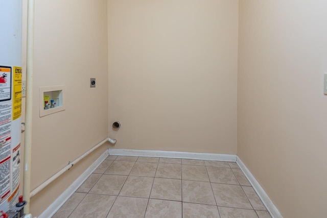 laundry room with electric dryer hookup, hookup for a washing machine, gas water heater, and light tile patterned flooring