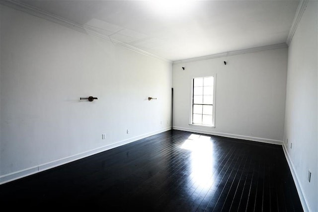 unfurnished room featuring ornamental molding and dark hardwood / wood-style floors