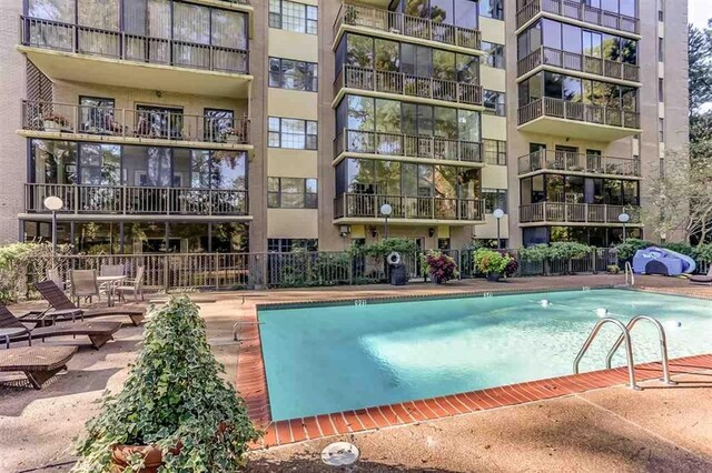 view of pool with a patio