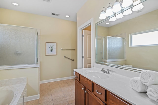 bathroom featuring vanity, a notable chandelier, tile patterned flooring, and shower with separate bathtub