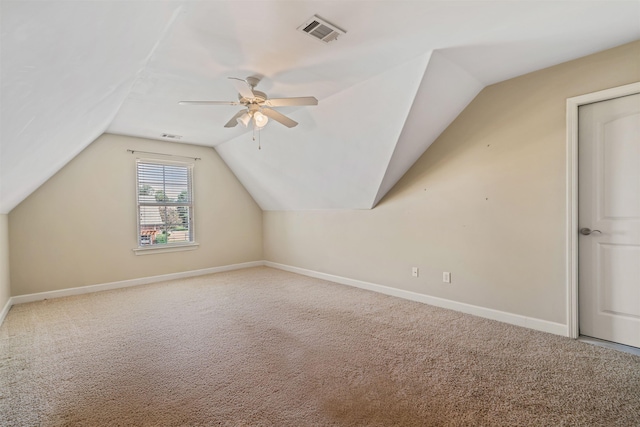 bonus room with carpet, lofted ceiling, and ceiling fan